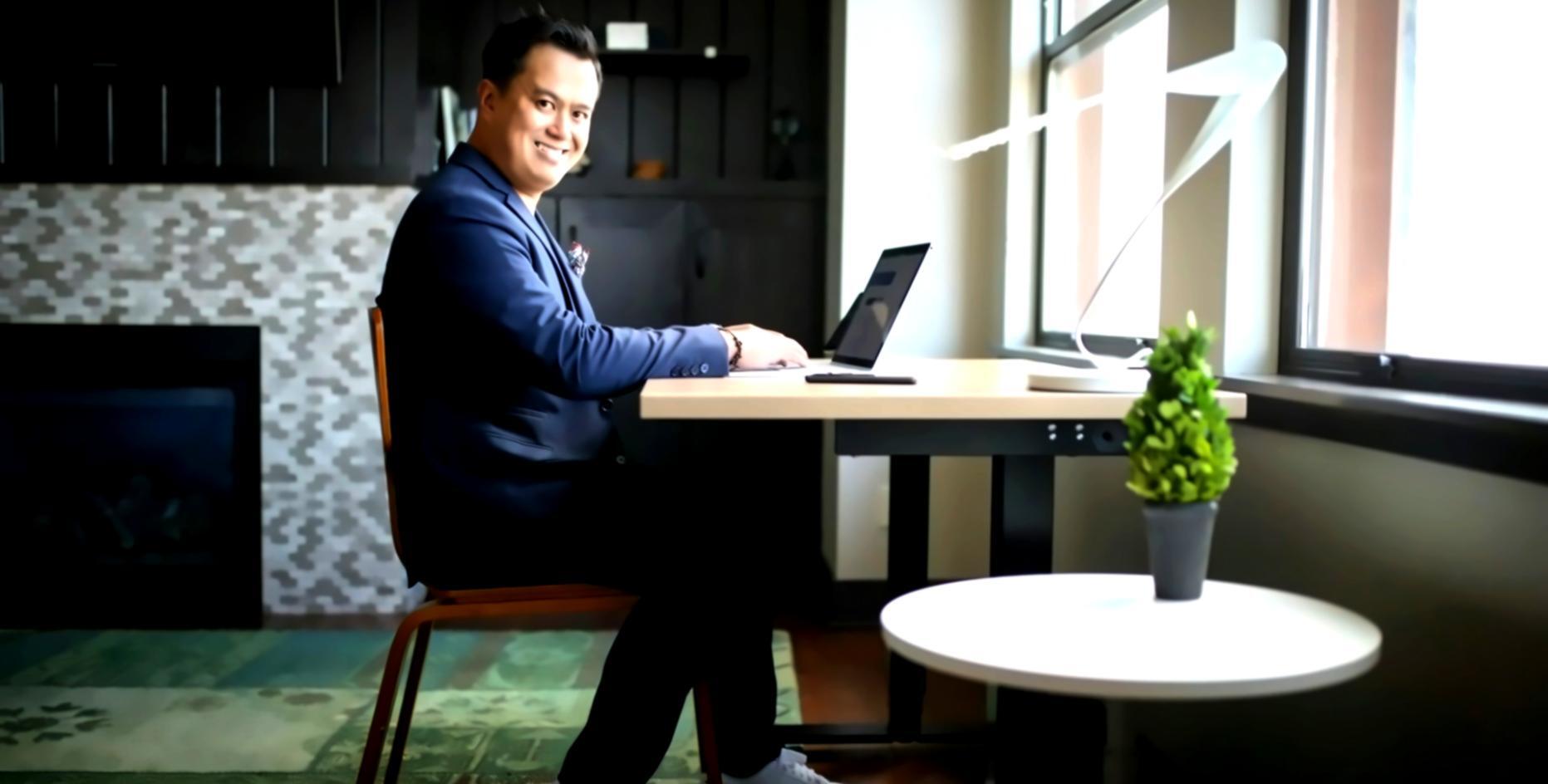 Professional analyzing investment charts and market data on multiple screens for comprehensive portfolio monitoring
